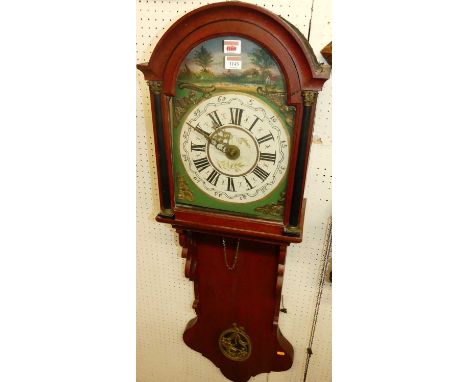A Dutch oak drop trunk wall clock with alarm and having painted arch dial, weight driven 30 hour movementClock is not running