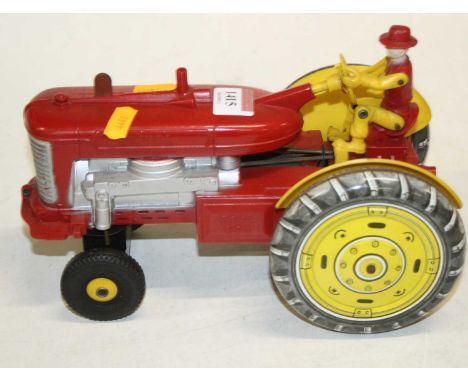 A Louis Marx &amp; Co of Great Britain tinplate and clockwork model of a reversible diesel electric tractor 