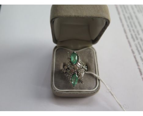 Diamond and emerald dress ring, baguette and brilliant cut diamonds, 9.89g, size M