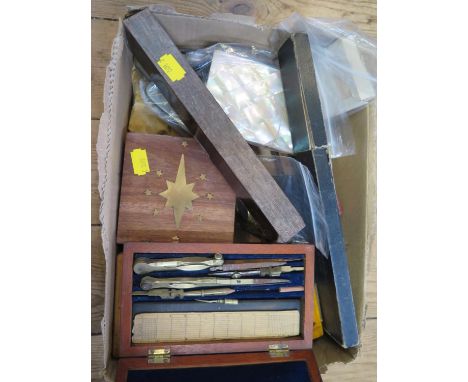 A small collection of early rulers and a wooden cased set of scientific instruments, together with fruit knives and cartwheel
