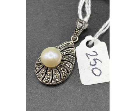 Silver marcasite teardrop pendant set with a pearl
