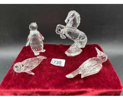 Four Swarovski glass animals