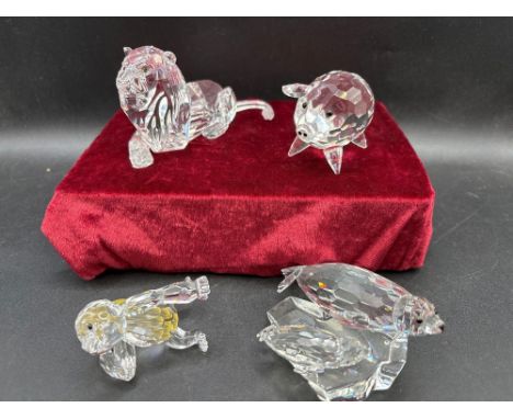 Four large Swarovski glass animals