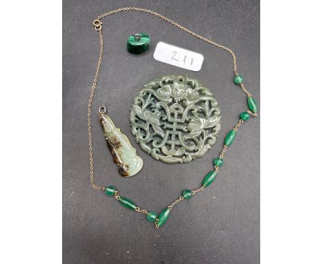A bag of assorted jade items