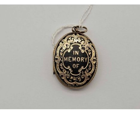 A back and front black enamel mourning locket 9ct 6.9 gms