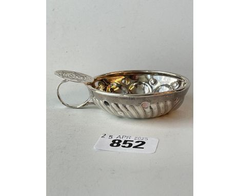 A foreign silver wine taster marked on handle 2.5 inches diameter