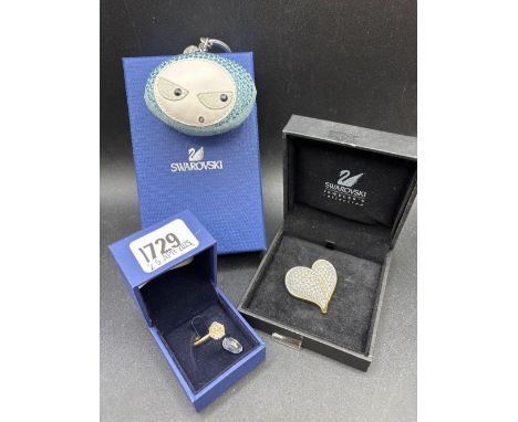 Swarovski witches heart brooch, a ring and a key ring, all boxed