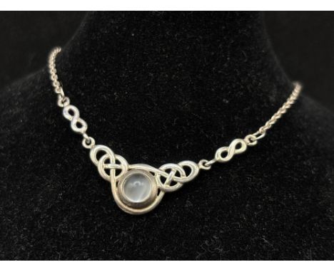 An attractive silver celtic style moonstone pendant necklace, 15 inch