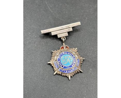 A silver and enamel sweetheart brooch