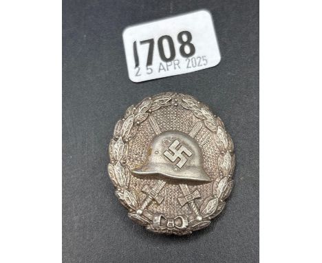 Oval silver Army badge