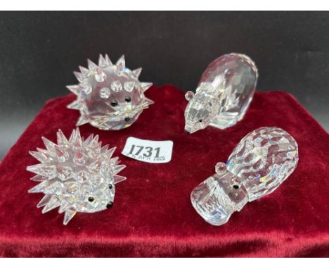 Four Swarovski glass animals