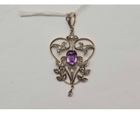 A GOLD AND SILVER FRAMED PENDANT WITH AMETHYST AND DIAMONDS 7.9 GMS