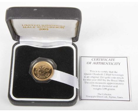 An Elizabeth II half-sovereign 2005, cased with ticket.