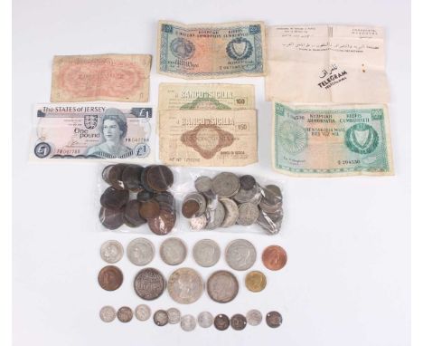 A large collection of European and world coins and banknotes, including an Egypt ten piastres 1916, a Canada Elizabeth II dol