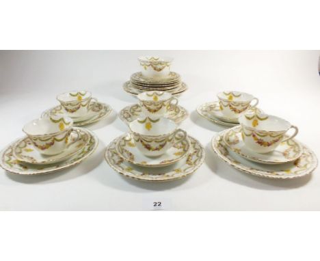 An Atlas china tea service comprising: six cups and saucers, twelve tea plates, cake plate and sugar 