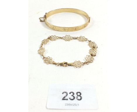 A 9ct gold bracelet with Celtic knot links, 3.2g, together with a rolled gold bangle 