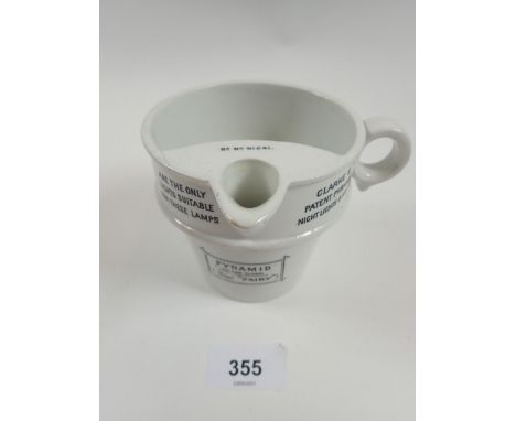 A pyramid "Fairy" night light oil jug 