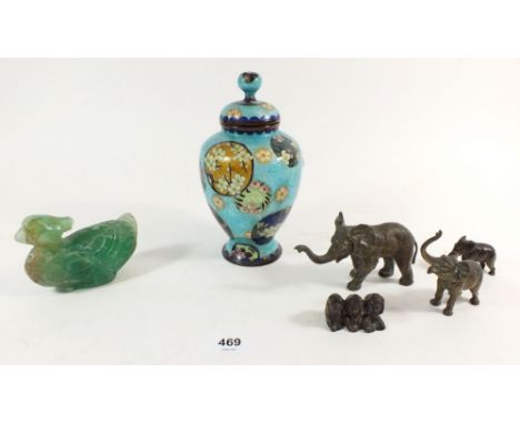 A green carved jade bird, cloisonne vase, three brass elephants etc. All A/F