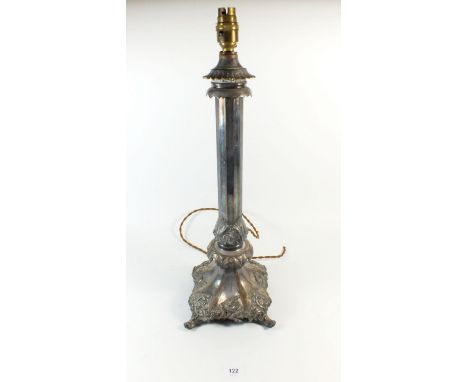 A large silver plated on copper candle lamp converted for electricity, marked to collar 'R. Bests Medium Candle Lamp, Under P