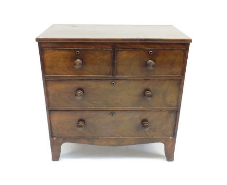 An early 19th century mahogany chest of small proportions on swept bracket supports, two short and two long drawers, 88 x 89 
