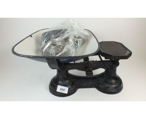 A set of kitchen scales and weights 