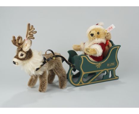Weihnachtsmann-Teddybär mit Rentier, Steiff, limitiert auf 2.500 Stück mit OVP, ohne Zertifikat, Fahnen mit Nr. 670565, Teddy