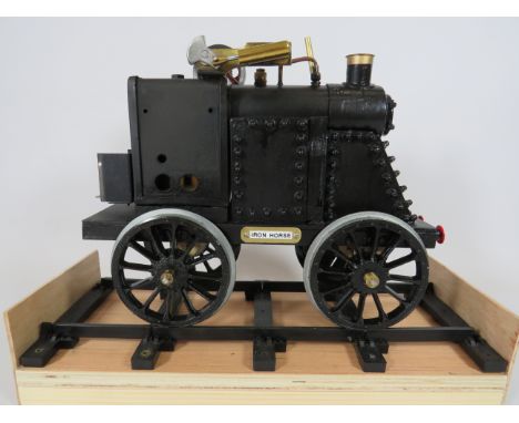 Custom Made hand crafted Replica of an Iron Horse Steam Locomotive in working order. Comes with short length of track which a