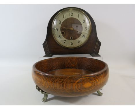 Smith chiming mantle clock in running order plus a wooden bowl standing on 3 metal feet.