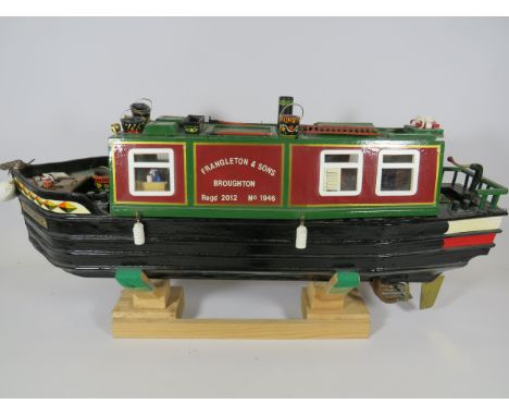 Lovely Home build hand made model of a Narrow boat.  Superb detail with working Steam powered 'Put-Put' engine.  Can be opera