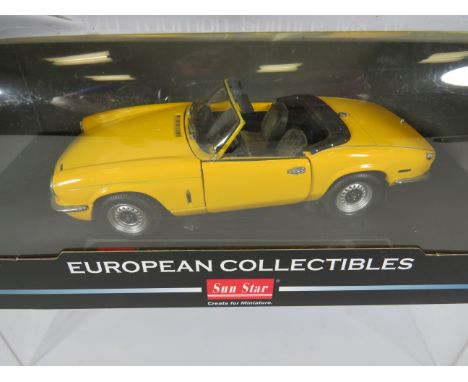 Sun Star, 1:18 Scale Die Cast model of a 1970 Triumph Spitfire MK IV.  Original box, no packaging.  Ex Display condition. See