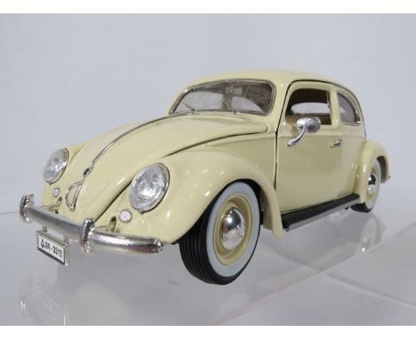 Burago 1:18 Scale Die Cast model of a 19575 Volkswagen Kafer Beetle. Original box but no packaging.  Ex Display condition.  S