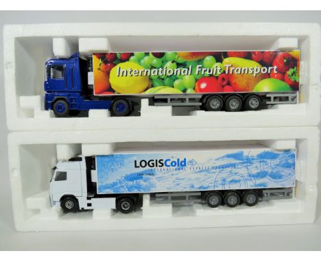 Two Die cast 1:50 Scale models by Joal of Articulated Lorries.   Original box and packaging.  Ex display condition.  See phot