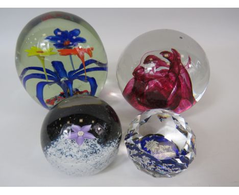 4 art glass paperweights including Caithness.