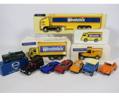 Selection of boxed and unused die cast model trucks.  Some Corgi and Fina-.  See photos. 