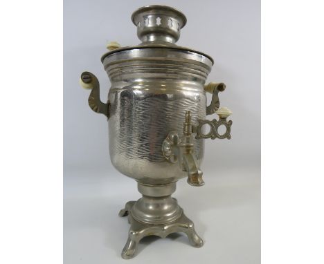 White metal vintage samovar comes with original bakelite and ceramic lead.