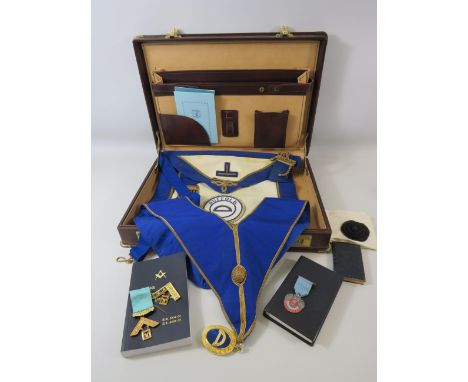 Masonic lot to include medals, sash, apron and books in a case.