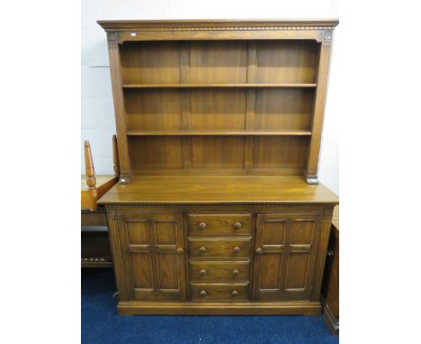 Mid Oak Coloured Ercol Dresser with plate rack above. H:74 x W:57 x D:21 Inches.  Very good condition.  See photos S2