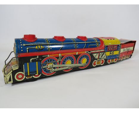 Marx British made Tin plate model train with friction motor. Fair condition.  19 inches long.  No box. See photos