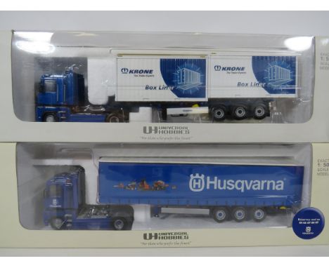 Two Die cast 1:50 Scale Models by Universal Hobbies. Both in original boxes and packaging. Ex Display condition.  See photos.