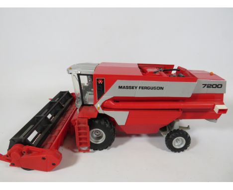 Brittains Die cast model of a Combine Harvester. 1:32 Scale in ex display condition. See photos.