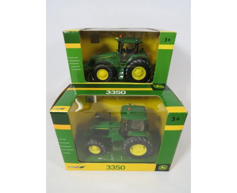 Two Die cast model John Deere tractors by Brittains 1.32 Scale. Both in ex display condition. See photos.