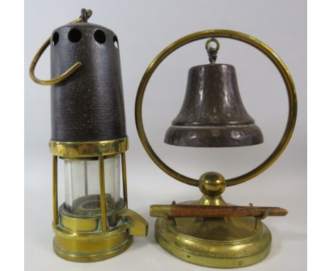 Vintage miners lamp from newcastle and a dinner bell.