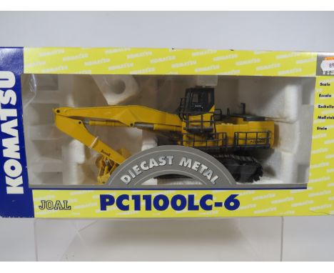 Joal Die Cast Metal 1:50 Scale Die Cast model of a Komatsu handler with Grab attachment..  Boxed ,  Ex Display condition.  Se