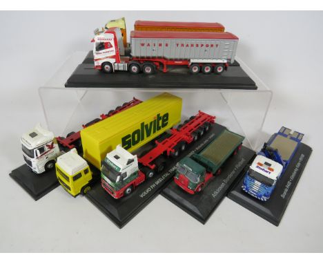 Seven various model trucks on plinths.1:76 Scale.  No boxes. Ex display condition. See photos