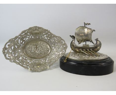 Silverplated model viking boat on a wooden base and a french embossed bonbon dish.