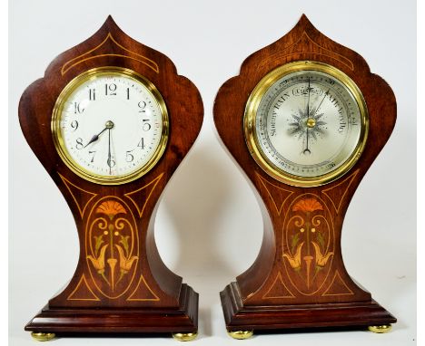 Matched pair of Early 20th Century mantle clock and barometer. Both housed in Art Nouveau inspired cases. Clock runs well but