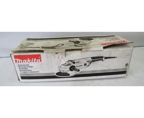 Makita Angle grinder which appears to be unsed in the box.