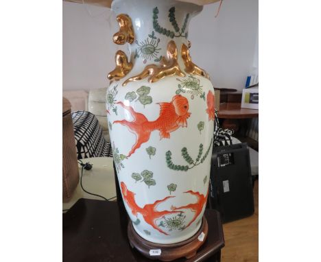 Oriental vase style table lamp on a circular wooden base ,..22 Inches tall.    See photos.  S2