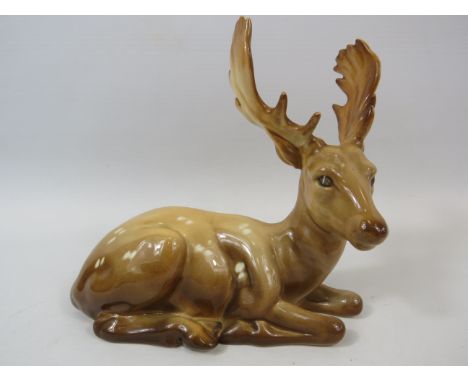 Beswick Stay laying down, Model no 954. Approx 15cm tall and 16cm long.