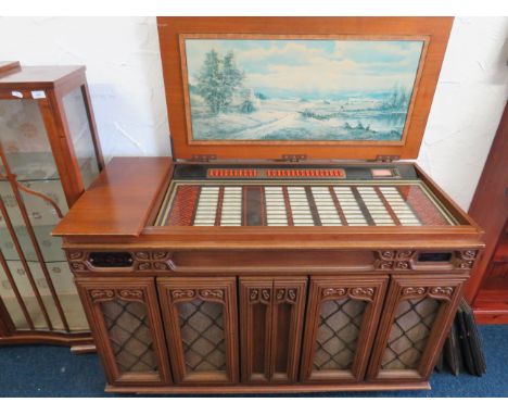 Wurlitzer Home juke box.  Cabaret 160 model , German made.  Working condition unknown.   Comes with keys. Sold as seen for sp